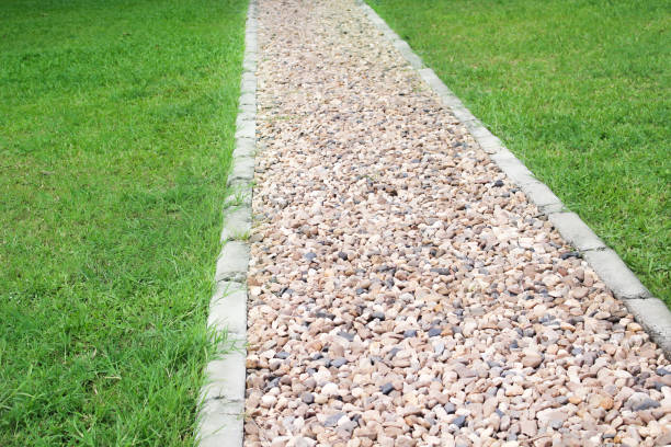 istock Stone walkway background with green grass , outdoor nature patterns 1137746625