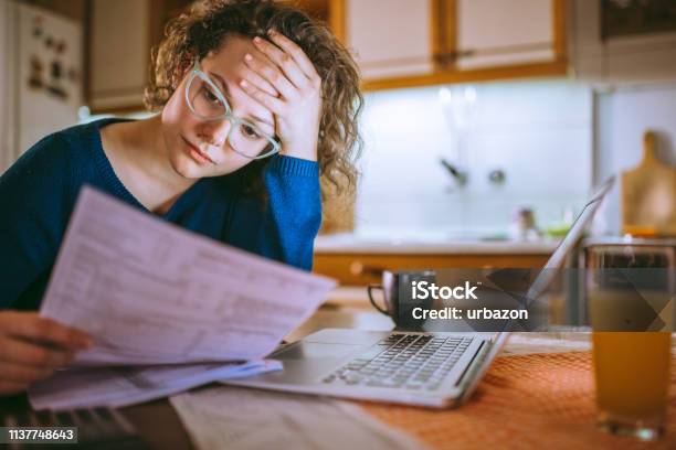 Going Through Documents Stock Photo - Download Image Now - Financial Bill, Tax, Finance
