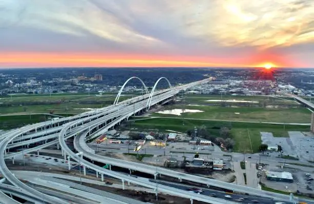 Photo of Major Freeway Intersection and Bridge and Sunset