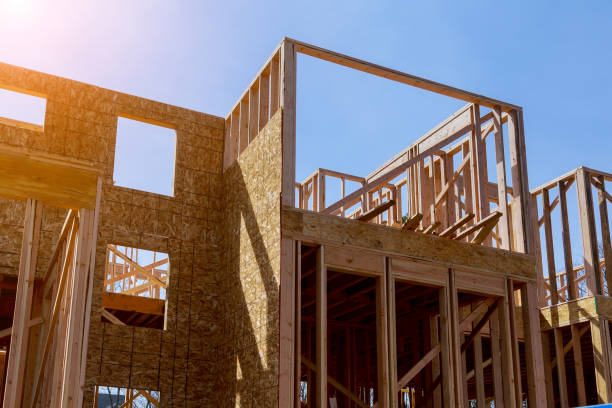 istock Residential construction home, wood beams with blue sky at construction 1137751677