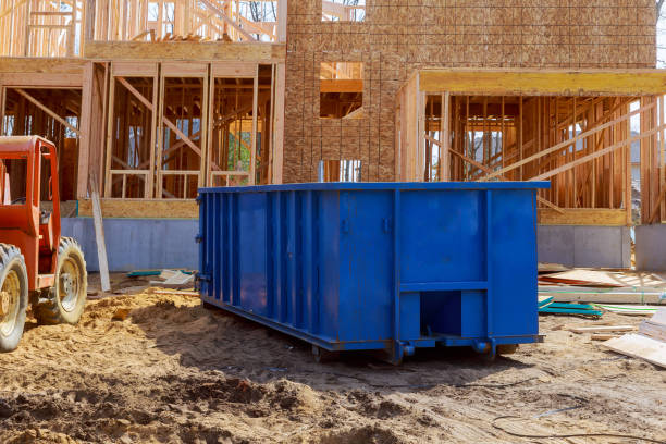 Blur dumpster, recycle waste and garbage bins near new construction site of appartment houses building Blur dumpster, recycle waste and garbage bins near new construction of appartment houses building industrial garbage bin stock pictures, royalty-free photos & images
