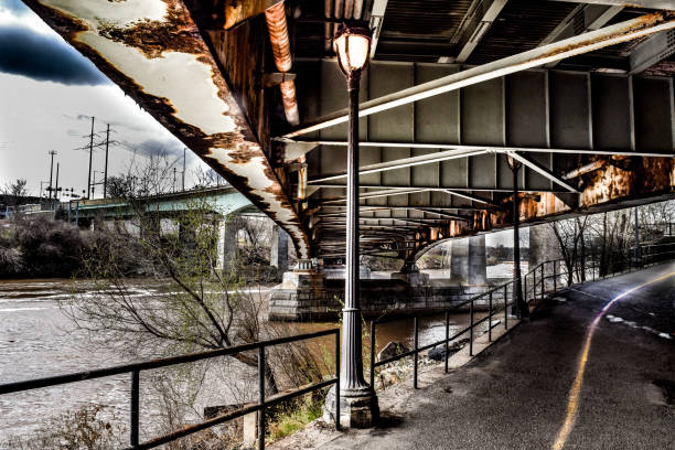 istock Old Street Light Underneath Rusty City Bridge 1137752161