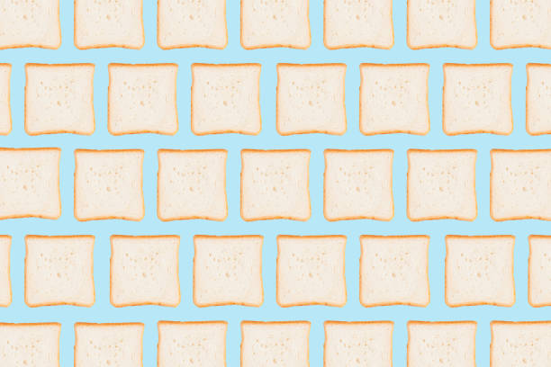 istock Sliced toast bread isolated on blue background 1137752997