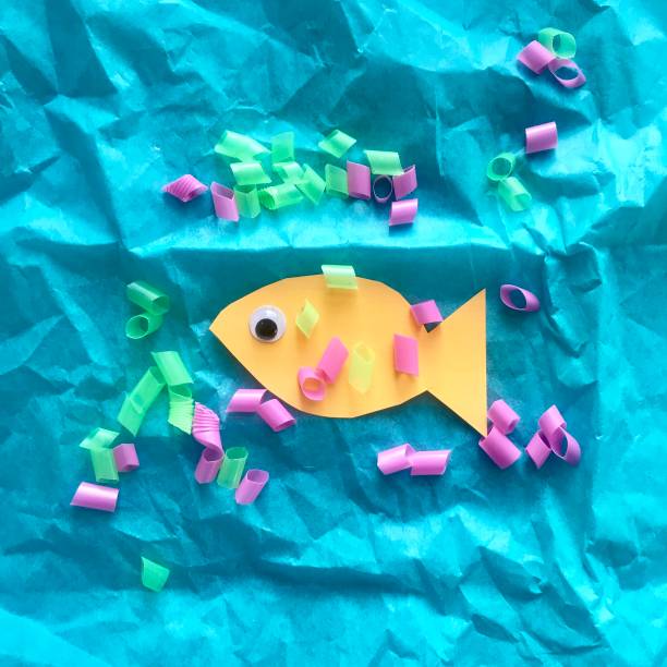 istock Plastic and Fish in Ocean Concept morning 1137754308