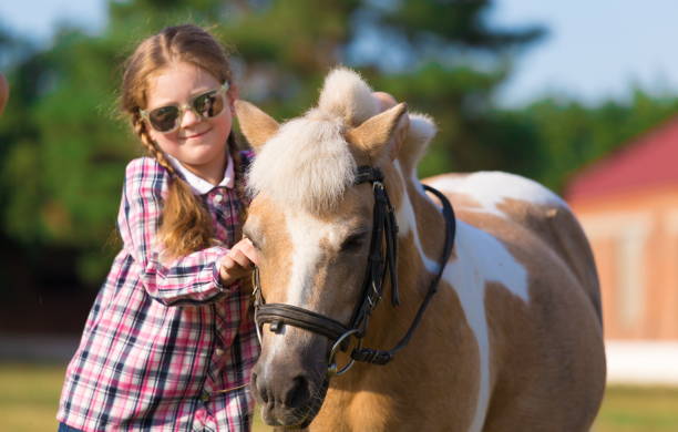 istock Pony. Face girl. Closed eyes. Close up 1137758423