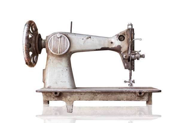 istock old sewing machine isolated on white background with clipping path. 1137759325