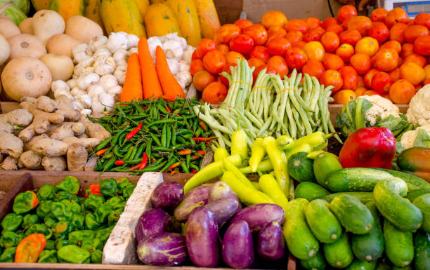 istock fresh vegetables on a market counter 1137759844