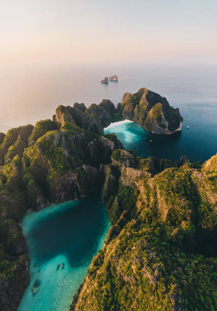 Scenic aerial view of Koh Phi Phi Island in Thailand Scenic aerial view of Koh Phi Phi Island in Thailand at sunrise andaman sea photos stock pictures, royalty-free photos & images