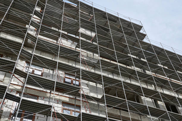 istock new building under construction, scaffolding and concrete 1137761922