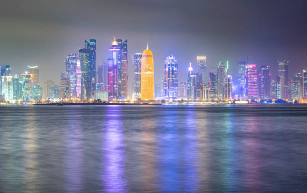 istock Doha Skyline and Reflection in Bay at Night - Doha, Qatar 1137762017