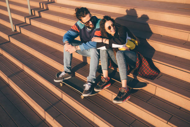 istock Young couple sitting on the stairs 1137763380