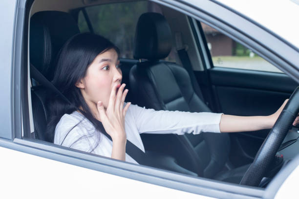 istock Young woman panic in a car - Image 1137765337