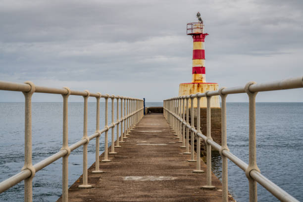 istock The Amble Pier Lighthouse, England, UK 1137767189