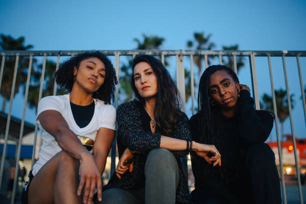 istock three young females expressing attitude in Venice beach, LA 1137768718