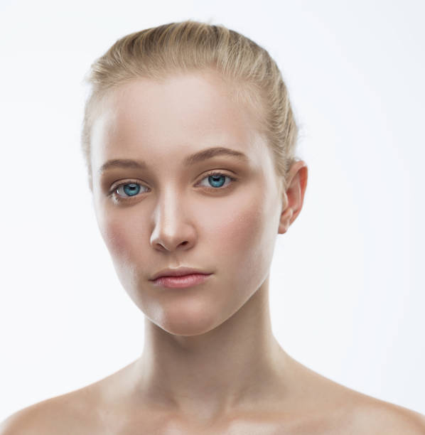 istock Face, serious, blue lenses, close up, white background 1137770338
