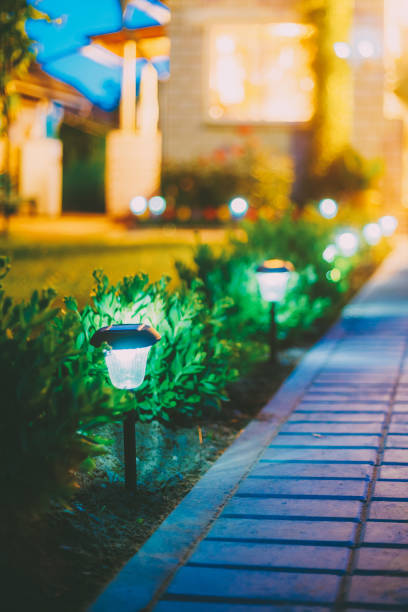 istock Solar Garden Light, Lanterns In Flower Bed. Garden Design 1137771623