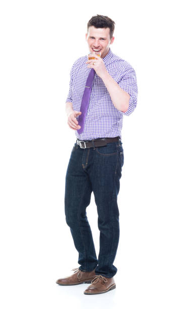 istock Attractive man standing and holding wisky drink 1137773268