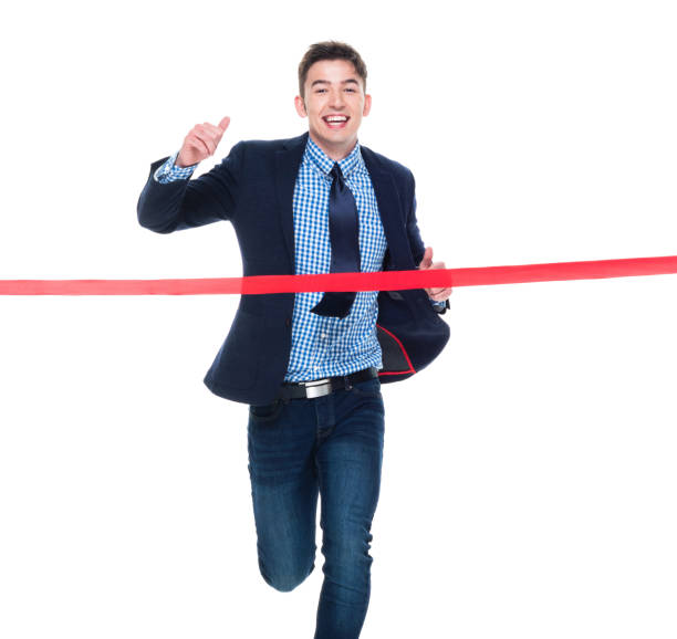 istock Attractive businessman crosses the finish line 1137773594