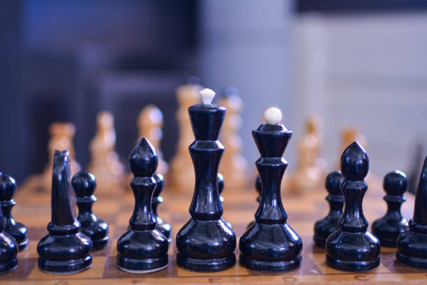 istock Black chess pieces in the foreground 1137775783