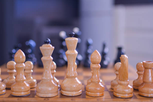 istock White chess pieces in the foreground 1137775853