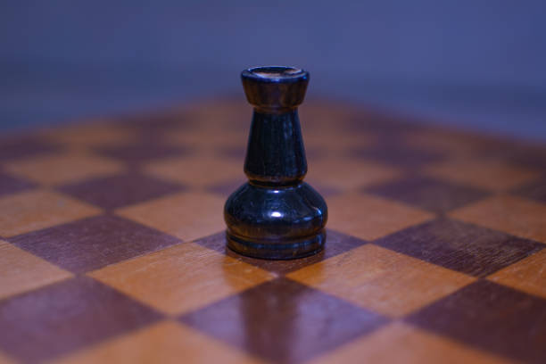 istock Black chess rook in the foreground 1137777332