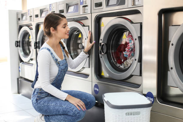 istock Woman washing her clothes 1137777363