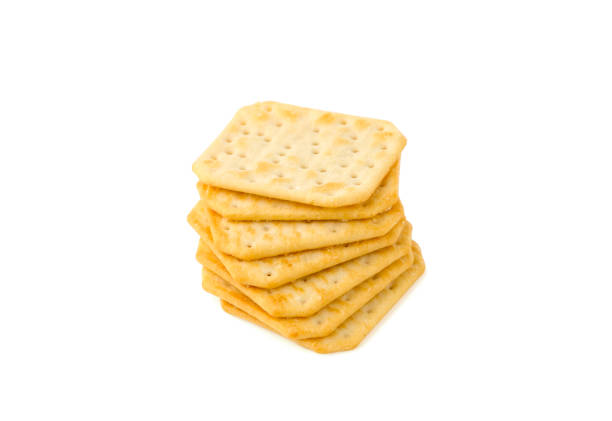 Crunchy and salty crackers isolated on white