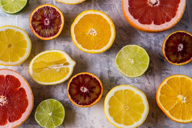 istock Flat lay view of slices different raw fresh citrus fruit. 1137782871