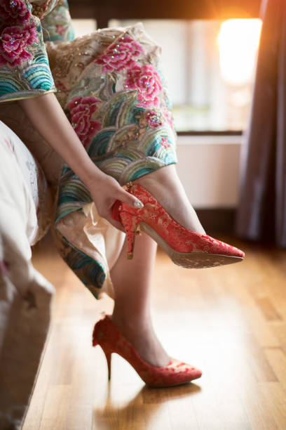 Chinese bride wearing red wedding heels on wedding day