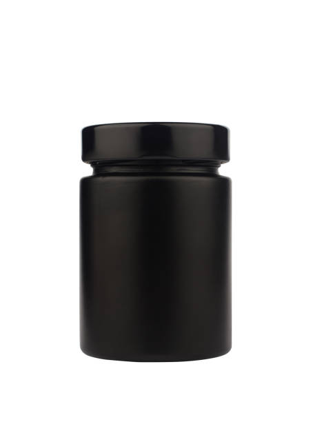 istock dark black jar with cap isolated on white 1137783562