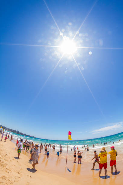 Sydney, Australia - April 14, 2019: People relaxing and enjoying a day off in Manly Beach, Sydney, Australia.