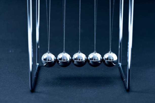 istock Newtons Cradle balancing balls, business concept in studio 1137797678