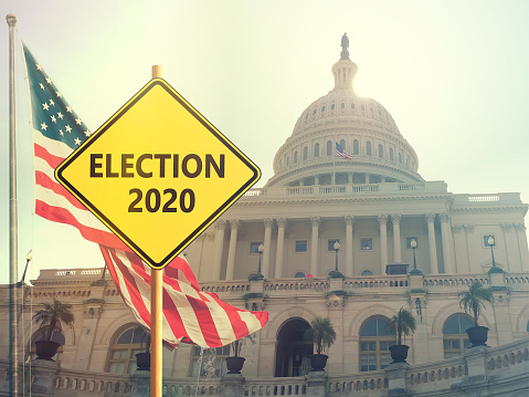 Election 2020 sign with american flag on background