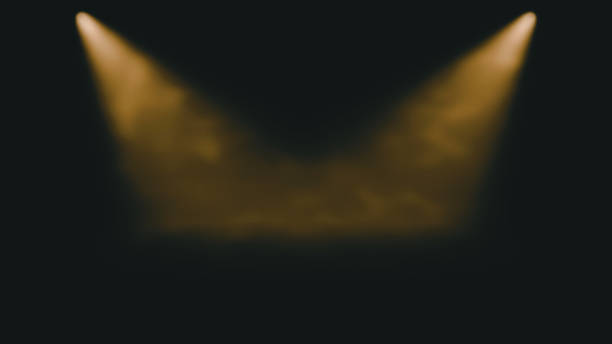 istock atmospheric golden stage background - two bright spotlights shine through dusty air 1137801898