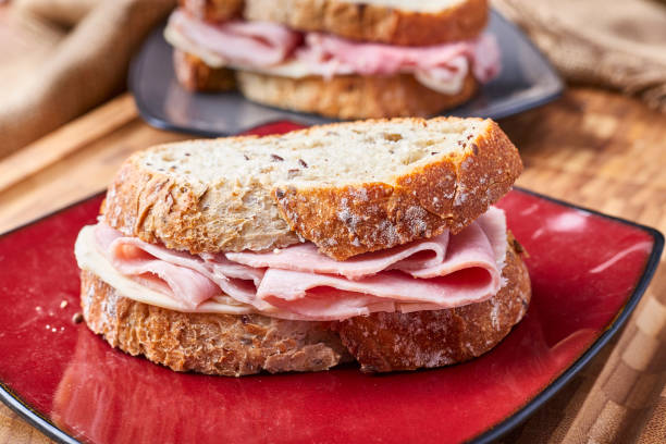 istock Gourmet Sandwich with Ham and orange juice 1137808023