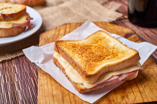 Grilled ham and cheese sandwich Grilled bread, han, cheese, sandwich, table ham and cheese sandwich stock pictures, royalty-free photos & images