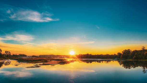 istock Beautiful Lake On Sunrise 1137809344
