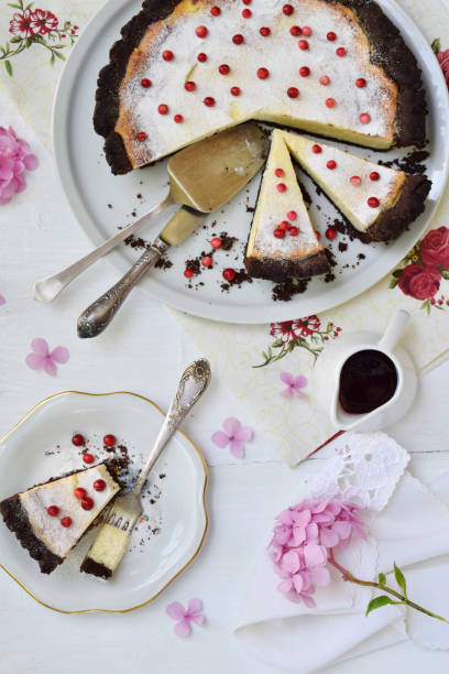 istock Vanilla cheesecake on chocolate shortbread dough. Cheese pie. Homemade baking 1137810941