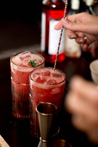 istock female bartender preparing cocktail in a cocktail bar 1137813580