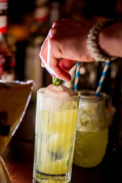 istock female bartender preparing cocktail in a cocktail bar 1137813590