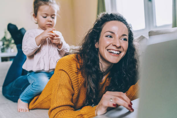 istock Mother and daughter Having fun online 1137814908