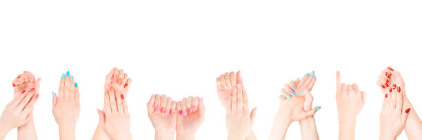 istock Hands with colored nail polish set in the row isolated with clipping path 1137817010