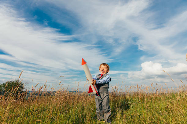istock Young Business Boy with a Rocket 1137818927