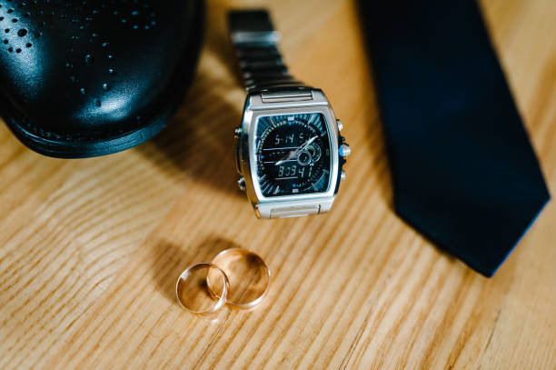 istock Wedding accessories groom on rustic brown wooden background. traditional idea composition. holiday concept. Side view. Stylish men's watch, accessory, business hours. 1137820874