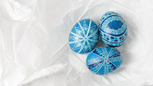 istock Pysanky on the white crumpled paper background 1137821192