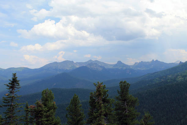 istock beautiful scenic clouds on mountain landscape Sayany 1137822983