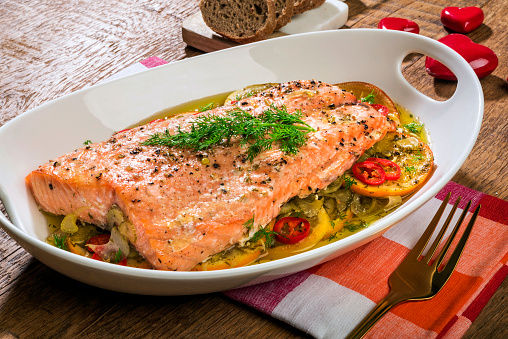 Fillet of baked salmon seafood portion in plate in Turkey.