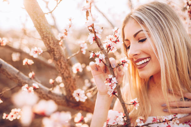 istock Sexy sensual blonde in the spring blossom. 1137828726