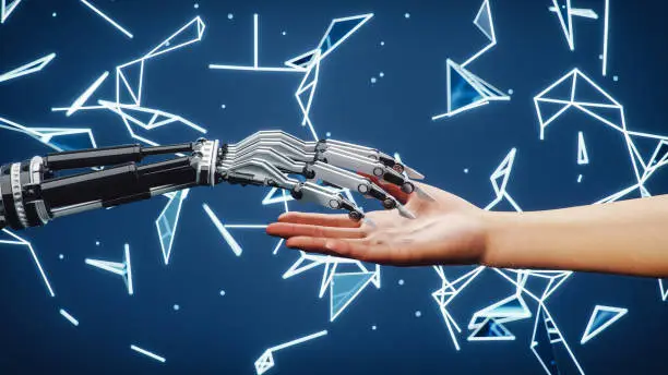 Robotic and human arm reaching each other on technology background.
