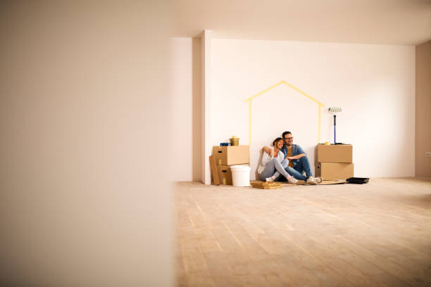 istock Couple in new apartment 1137836643